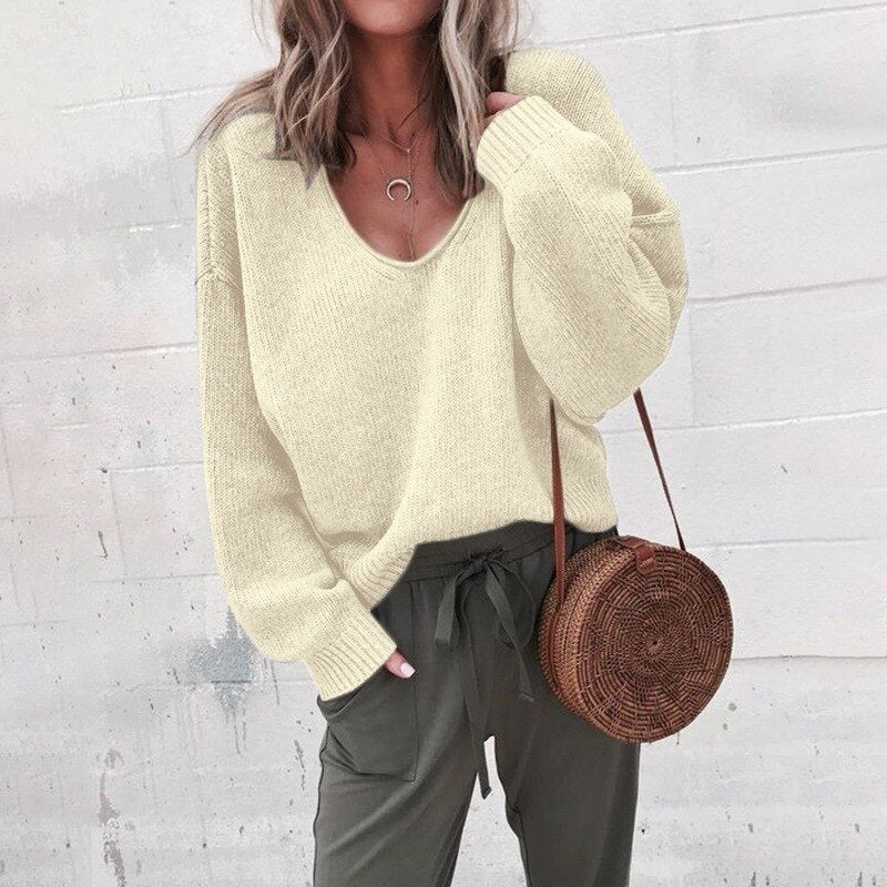 Women's textured V-neck knit sweater with long sleeves and ribbed trims