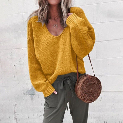 Women's textured V-neck knit sweater with long sleeves and ribbed trims