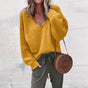 Women's textured V-neck knit sweater with long sleeves and ribbed trims