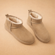 Women's ultra mini boots with fur-style lining and pull tabs