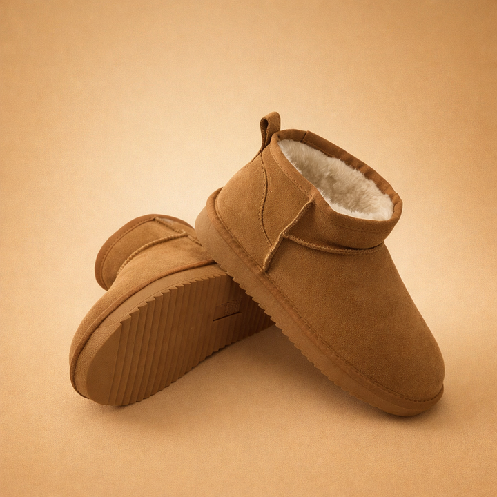 Women's ultra mini boots with fur-style lining and pull tabs