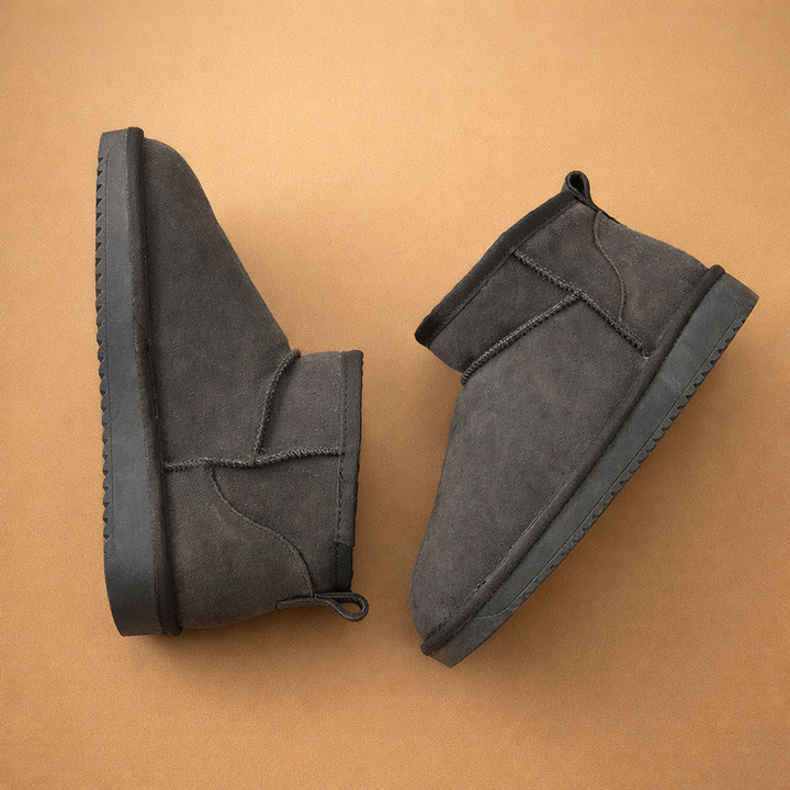 Women's ultra mini boots with fur-style lining and pull tabs