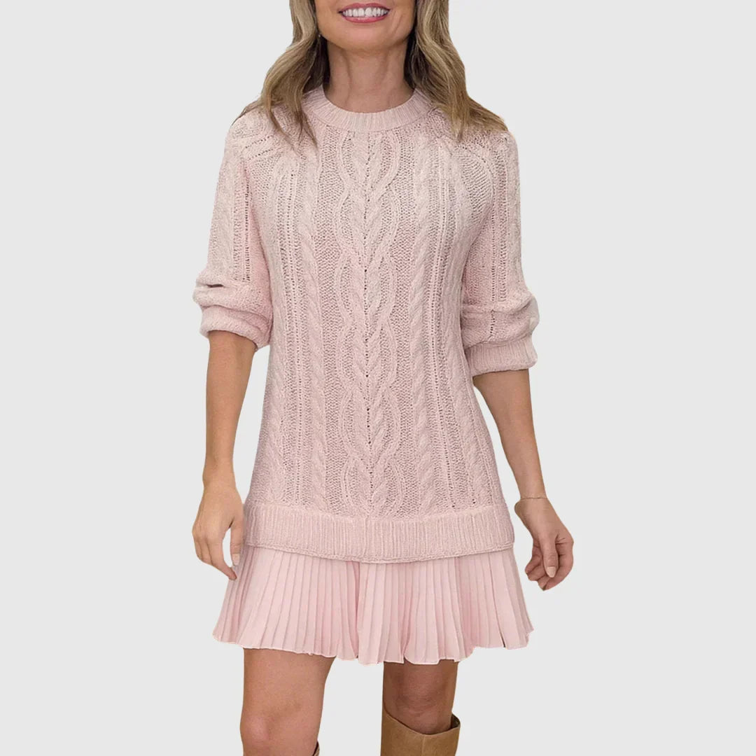 Women's cable knit sweater dress with crew neck and pleated mini hem