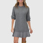 Women's cable knit sweater dress with crew neck and pleated mini hem