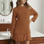 Women's cable knit sweater dress with crew neck and pleated mini hem