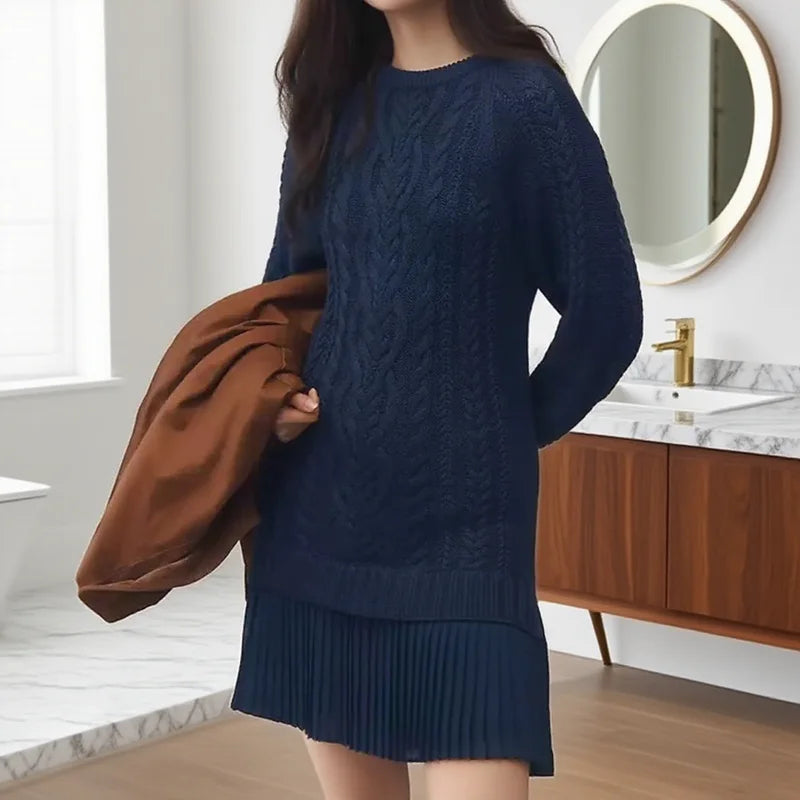 Women's cable knit sweater dress with crew neck and pleated mini hem