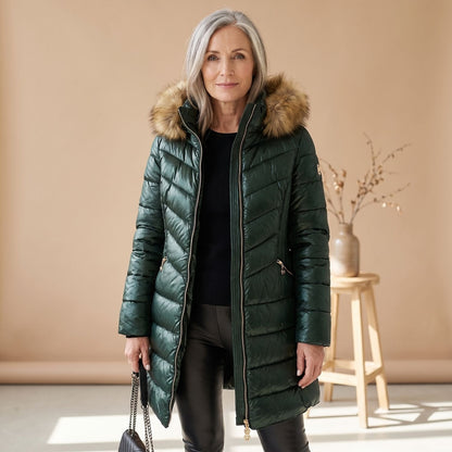 Women's longline quilted puffer coat with hood and faux fur trim