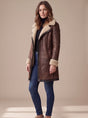 Women's long coat with shearling-style collar and cuff trims