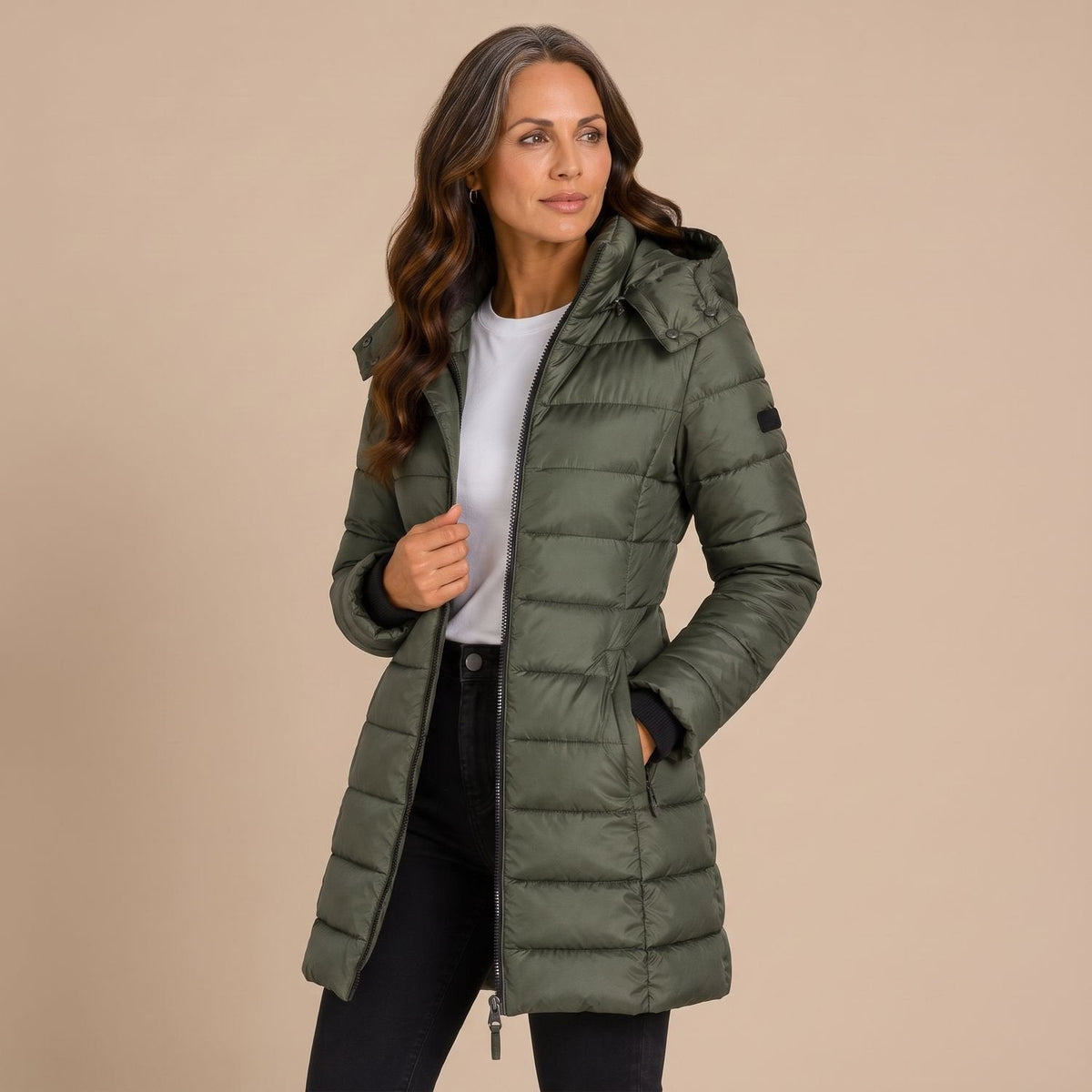 Women's quilted hooded longline puffer jacket with zip front and slanted pockets