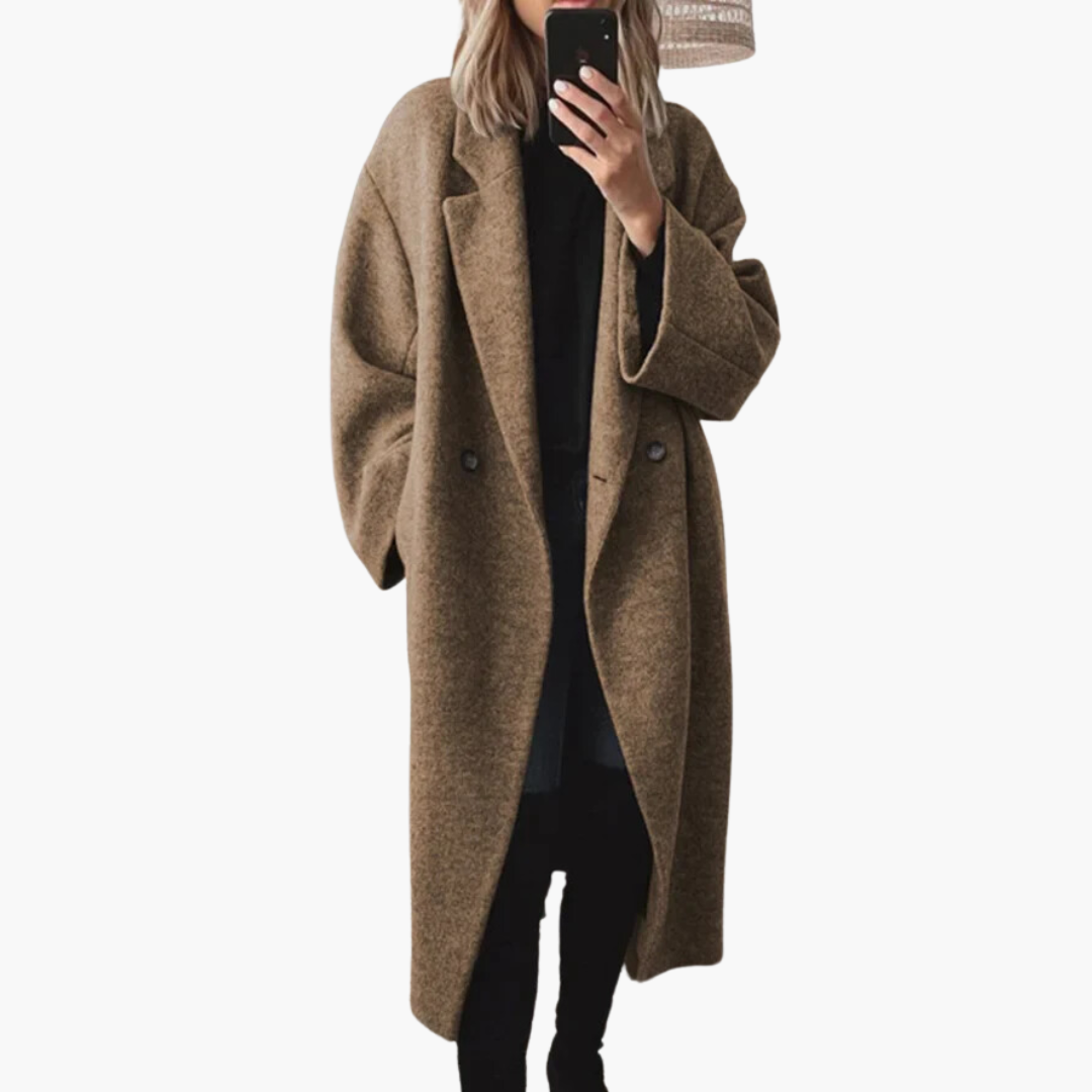 Women's longline collared coat with wide lapels, long sleeves and button details