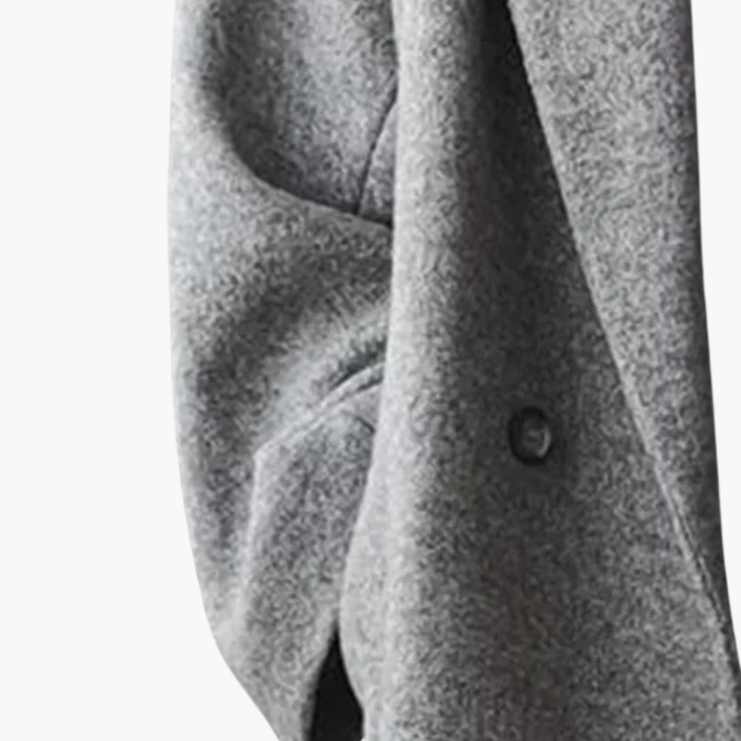 Women's longline collared coat with wide lapels, long sleeves and button details