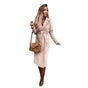 Women's longline belted trench coat with lapel collar and midi length
