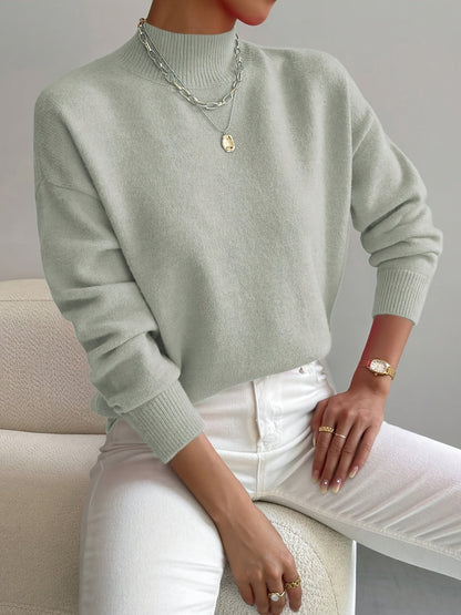 Women's relaxed mock turtleneck sweater with long sleeves and ribbed trims