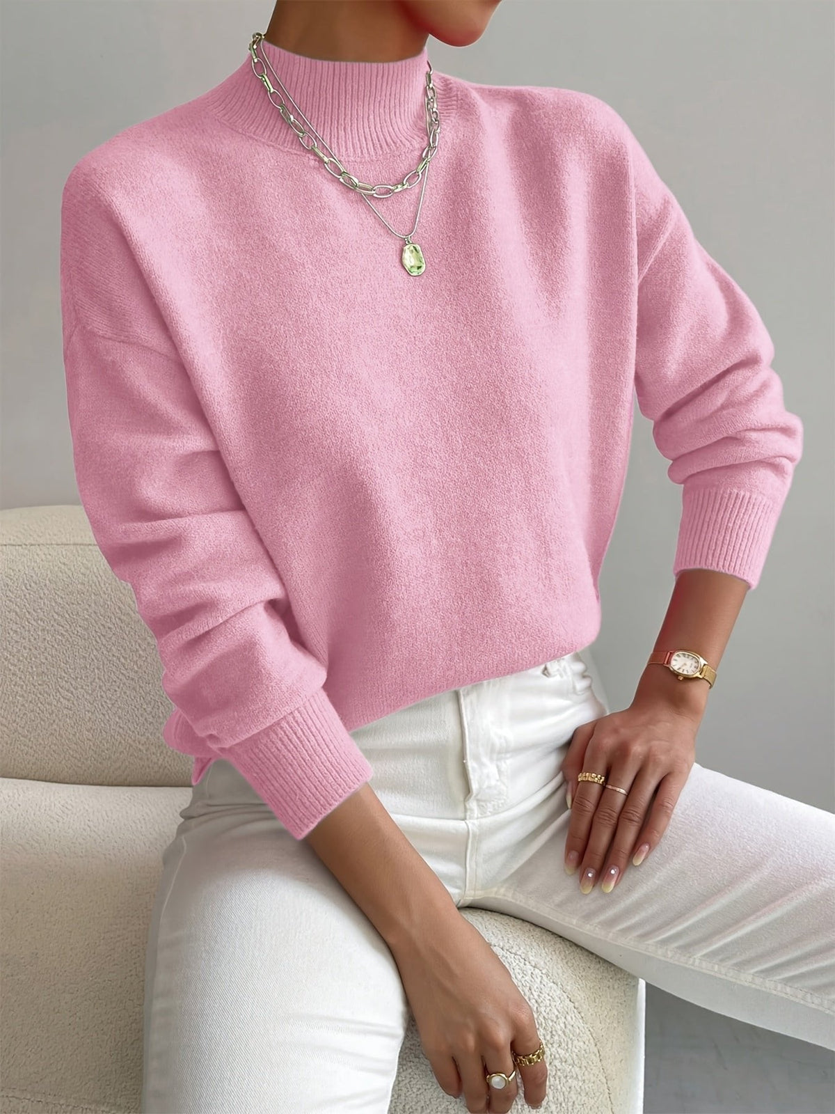 Women's relaxed mock turtleneck sweater with long sleeves and ribbed trims