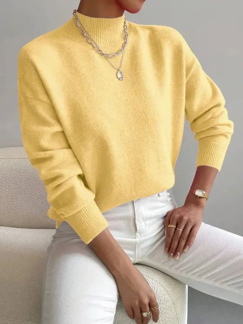 Women's relaxed mock turtleneck sweater with long sleeves and ribbed trims