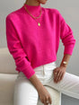 Women's relaxed mock turtleneck sweater with long sleeves and ribbed trims