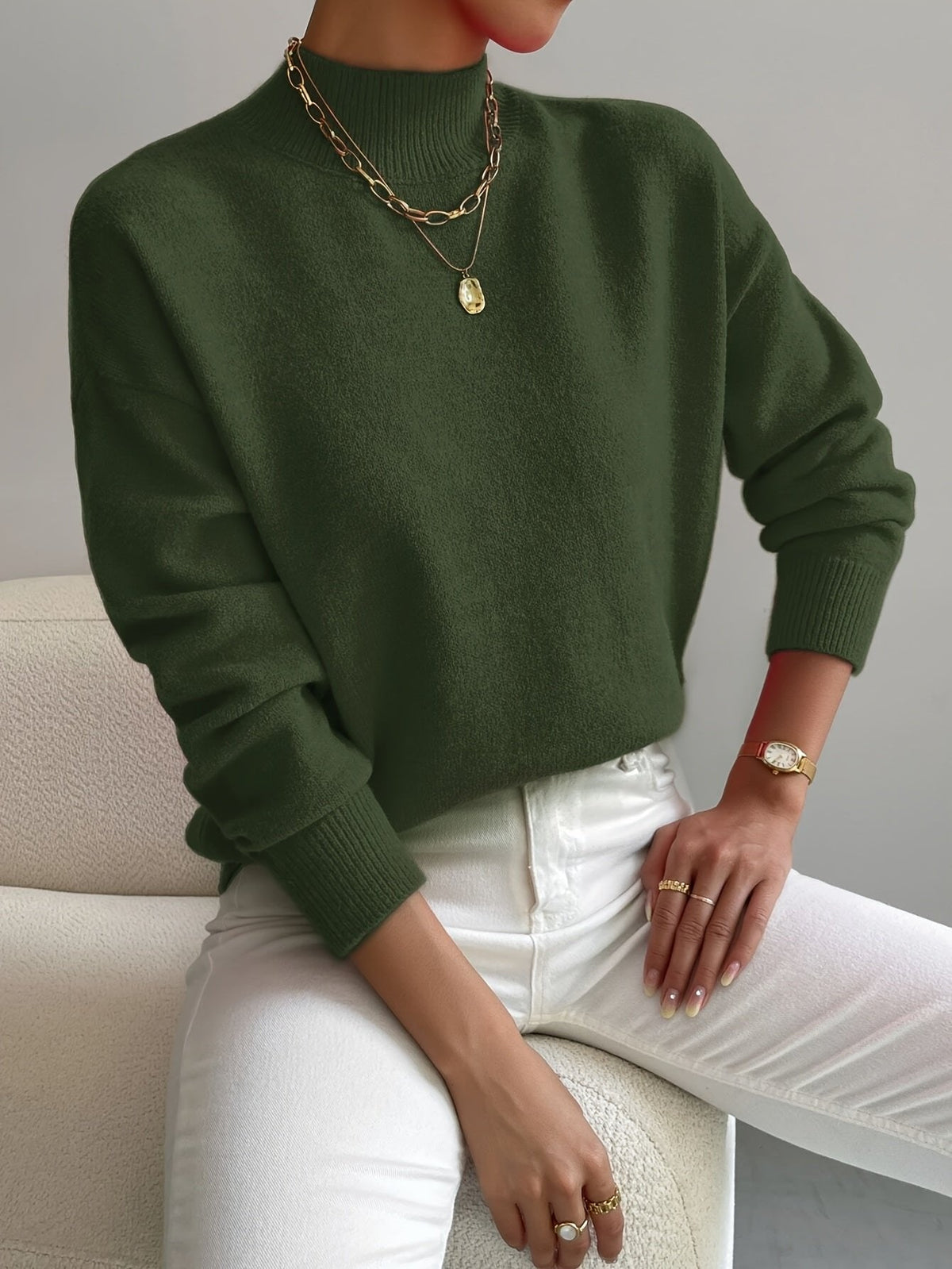 Women's relaxed mock turtleneck sweater with long sleeves and ribbed trims