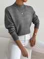 Women's relaxed mock turtleneck sweater with long sleeves and ribbed trims