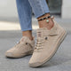 Women's casual lace-up sneaker with stitched panels and side strap