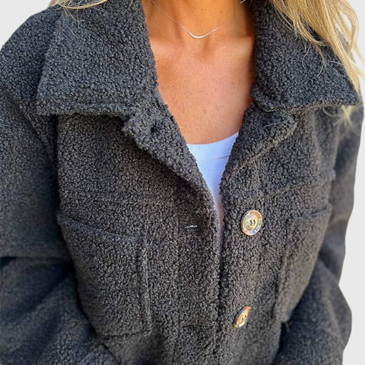 Women's textured button jacket with wide collar and front patch pockets
