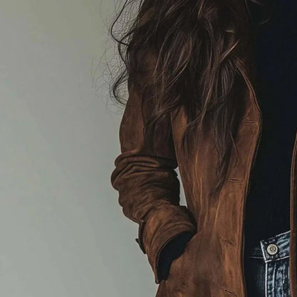 Women's longline button front coat with notched lapels and side pockets