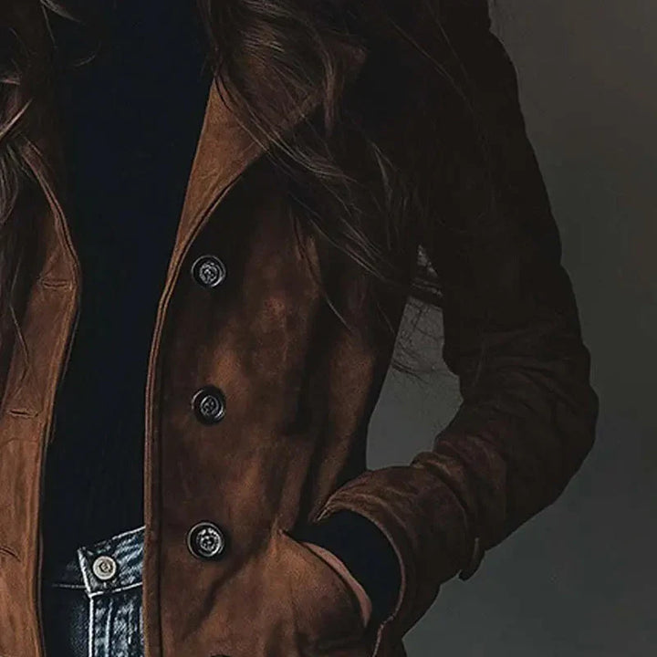 Women's longline button front coat with notched lapels and side pockets